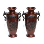 A pair of Japanese bronze vases Both vases with small casting blemish marks. Surface scratches and