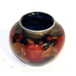A William Moorcroft pomegranate vase With surface scratches in parts. Minor scuff marks. First