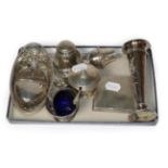 A quantity of assorted silver including embossed trumpet vase; condiments; hip flask etc