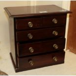 An apprentice chest of drawers Slight fading in parts. Some small scratches and staining visible