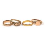 A 22 carat gold band ring, out of shape; a 9 carat gold band ring, finger size J; a 9 carat gold