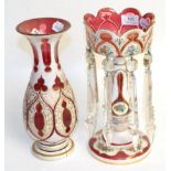 A 19th century cranberry and white glass lustre and a similar vaseLustre - with small chips in