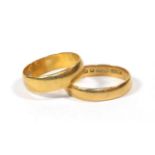 Two 22 carat gold band rings, finger sizes P and M1/2 (2). Gross weight 8.06 grams.