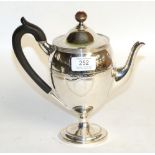 A George V silver coffee-pot, by Roberts and Belk, Sheffield, 1912, tapering and on spreading
