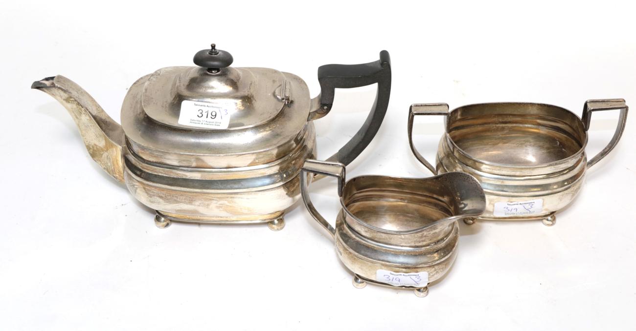 A George VI three-piece silver tea-service, by William Hutton and Sons, Sheffield, 1937, each