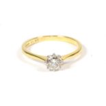 An 18 carat gold solitaire diamond ring, a round brilliant cut diamond in a claw setting, to knife