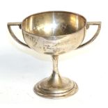 A George V silver twin-handled cup, by Vaughton and Sons, Birmingham, 1926, tapering and on pedestal