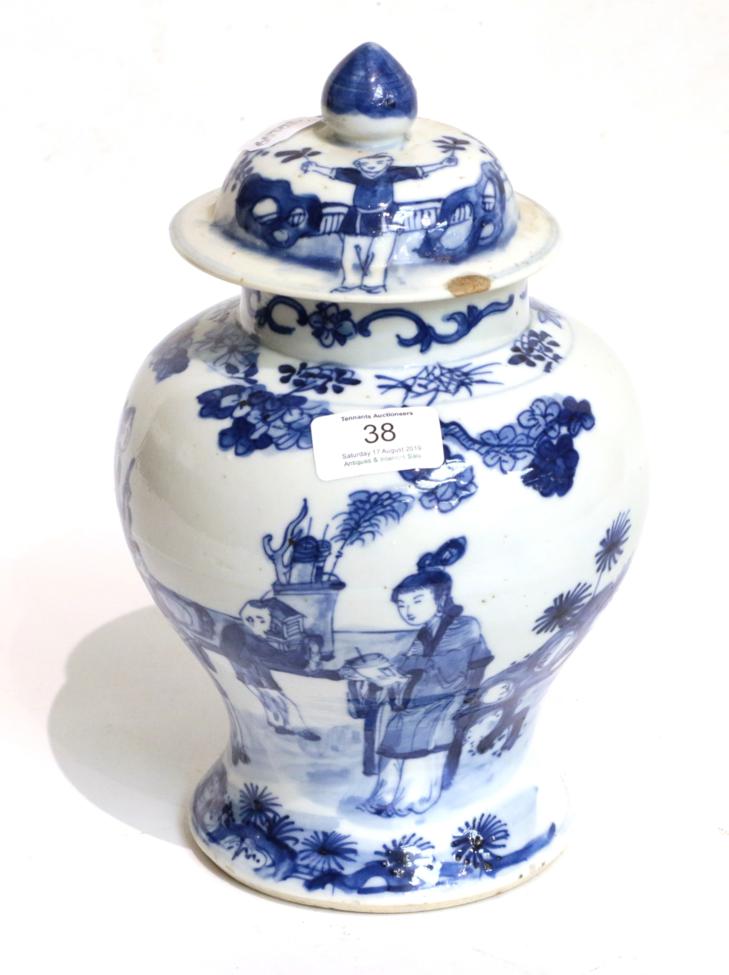 A 19th century Chinese blue and white figural vase and cover Vase and cover with firing blemish