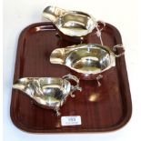 Three silver sauceboats, one by Adie Brothers, Birmingham, 1938, one by Vines, Sheffield, 1946 and