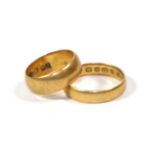 Two 22 carat gold band rings, G1/2 and M1/2 (2)Gross weight 8.07 grams.