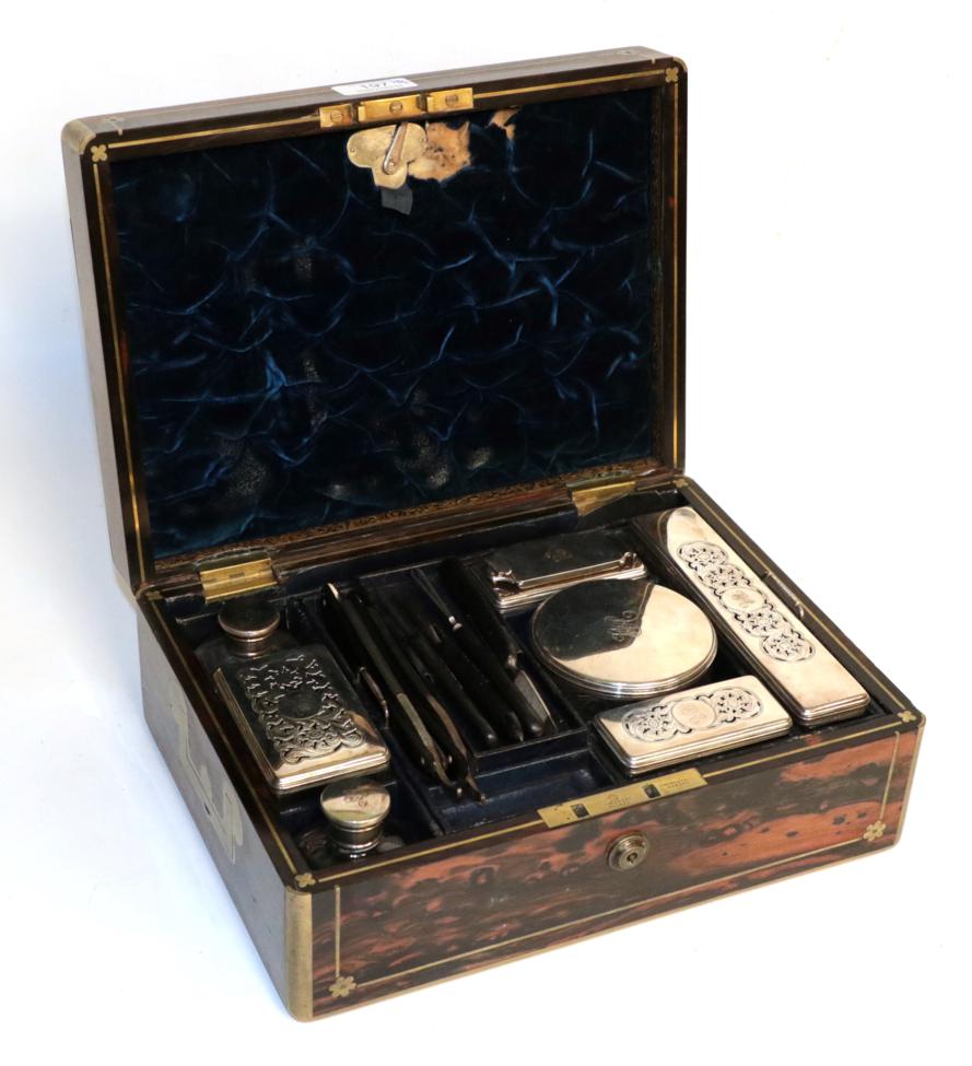 A William IV silver-mounted dressing table-set, the silver mounts London, 1831, contained in a