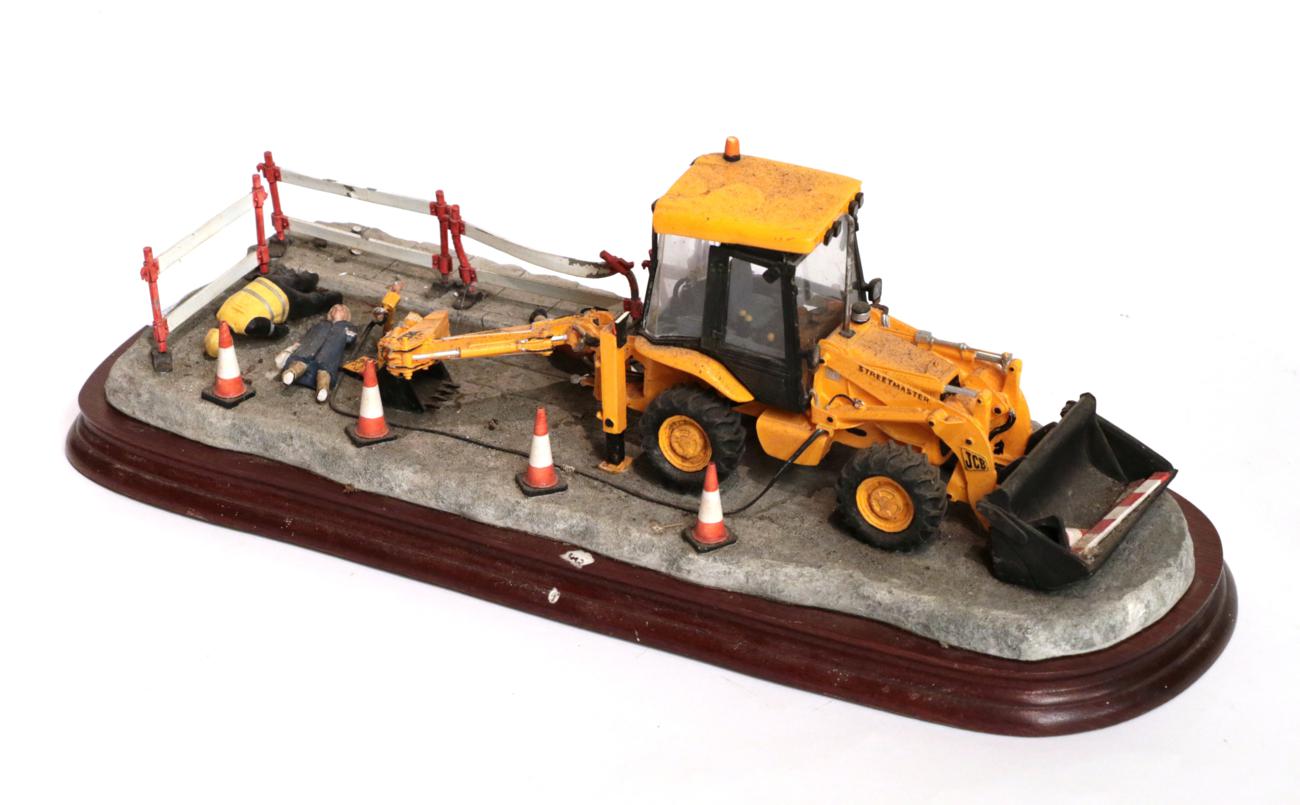 Border Fine Arts JCB model, limited edition 1379/1750, on wood base (a.f.). Badly damaged