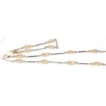 A 9 carat two colour gold fancy link necklace, length 46.5cm; and matching bracelet, length 18cm (