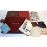 A Victorian scrap album containing chromolithographic scraps, cut-paper greetings cards, etc, an