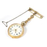 A lady's gold fob watch on a mounted 9 carat bar brooch