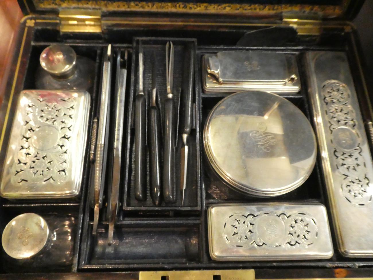 A William IV silver-mounted dressing table-set, the silver mounts London, 1831, contained in a - Image 3 of 4