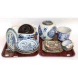 Three 19th century Chinese export blue and white plates, two later Canton famille rose plates, a
