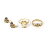A 9 carat gold peridot ring, finger size M; a pair of matching earrings, stamped '9CT'; together