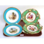 A pair of 19th century Minton cabinet plates decorated with Continental scenes, together with a