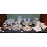 An 18th century Chinese porcelain tea bowl; a 19th century Delft plate; two Victorian name plates; a