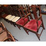 Three Hepplewhite style dining chairs; a mahogany carver chair; a matching dining chair; and two