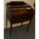 A late Victorian roll top desk