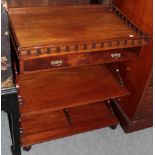 An Edwardian mahogany side table