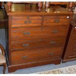 A late Victorian four-height chest of drawers