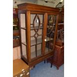 An Edwardian mahogany inlaid display cabinet