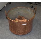 A large twin handled copper log bin, 34.5cm high by 52cm diameter