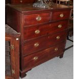 An early 19th century mahogany four-height chest of drawers