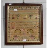 Alphabet sampler worked by Mary Burton, dated 1862, with religious verse to the centre and