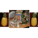 A pair of glazed pottery pineapple ornaments; and two elephant conservatory tables (4)