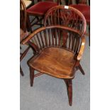 A 19th century Windsor armchair with spindle and a central splat back (a.f.)Signs of old worm.