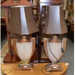A pair of modern table lamps with shades