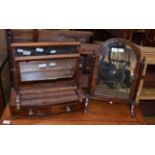 Three 19th century bedroom dressing table mirrors; and a Victorian mahogany three-tier wall rack