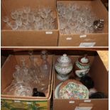 A quantity of drinking glasses and decanters, together with Oriental ceramics and hardwood stands (