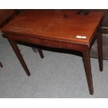 A 19th century mahogany fold over tea table