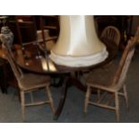 A reproduction breakfast table; a reproduction oak chest; four pine dining chairs; a pine wall rack;