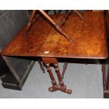 A Victorian walnut veneered Sutherland table