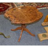 A Yorkshire School burr oak occasional table, on four splayed legs, 66cm wide by 46cm high