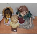 Late 19th century wax bust of a young child, with short wavy hair and ribbon, on a square wooden