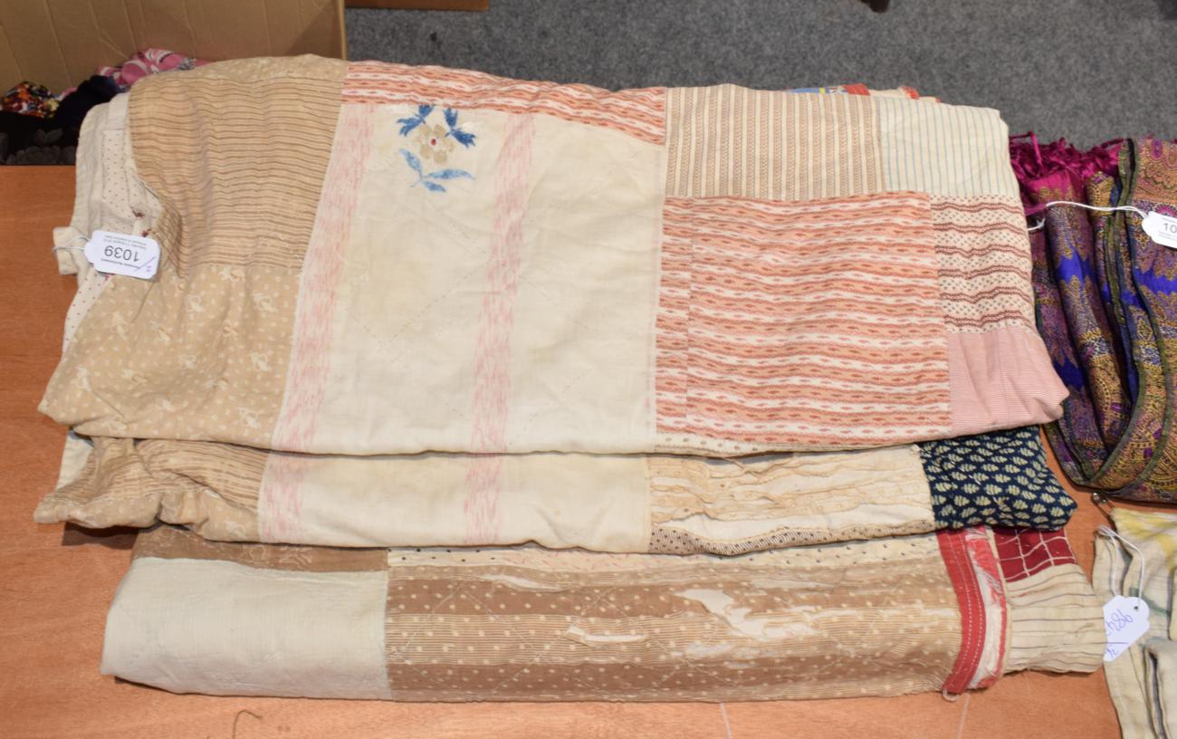 19th Century patchwork quilt with central square enclosing red and white alternating patches and red