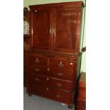 A George III mahogany four height chest of drawers, with associated cabinet