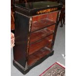 A Victorian ebonised inlaid four-tier open bookcase The ebonised surfaces are rubbed. Scratches