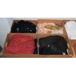 Four boxes of assorted evening scarves, black lace stoles, black silk top, underskirts etc