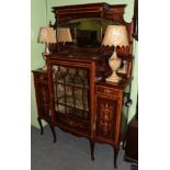 An Edwardian mahogany inlaid mirror backed display cabinet The cabinet with minor chips to the edges
