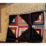 Late 19th century log cabin pattern patchwork bed cover, incorporating coloured silks, brocades