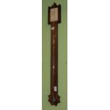 A mahogany stick barometer