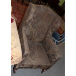 A Victorian mahogany wing back armchair